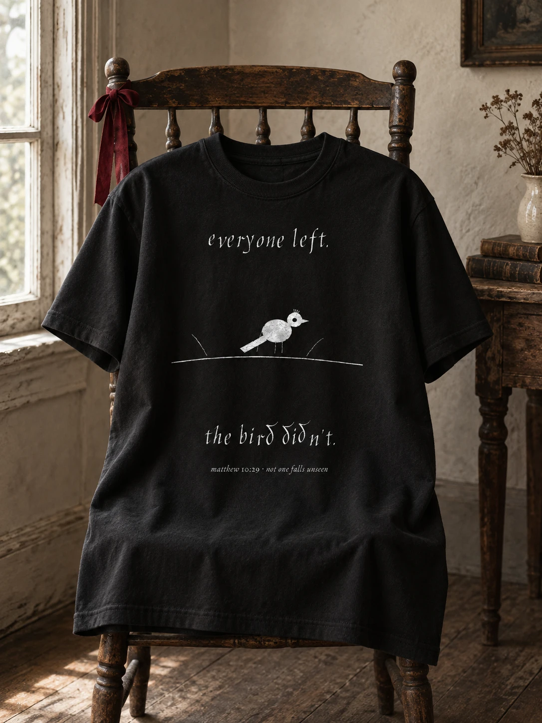 lot no. 006, the cardinal tee — the estate's bird drawn proud on a bare branch