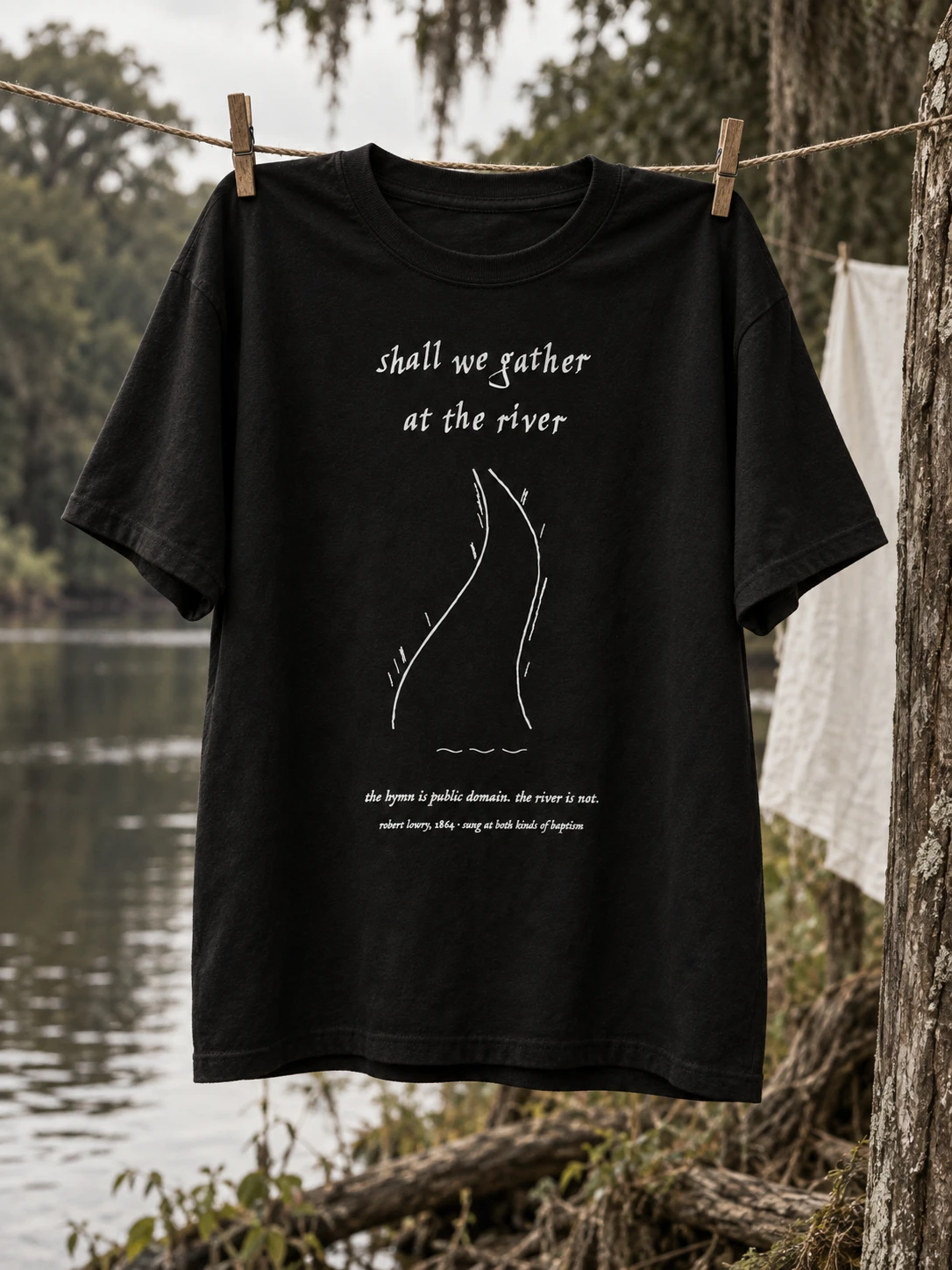 lot no. 008, the river hymn tee — shall we gather at the river, printed over a winding river